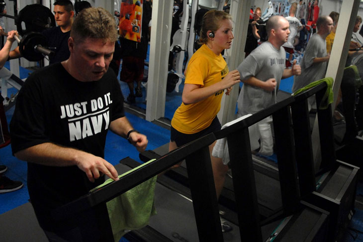 People exercise in the bowflex max trainer